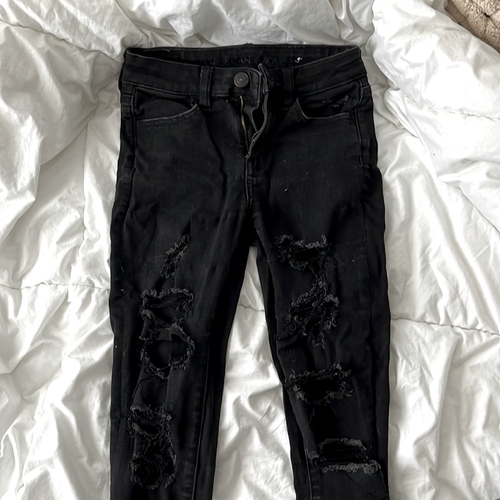 Black ripped jeans